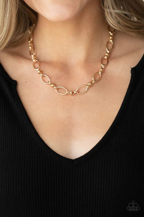 "Defined Drama" - Gold #1300 - Paparazzi Accessories