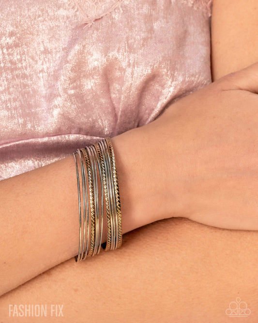 "Liberated Legend" -  Silver/Gold #1999 - Paparazzi Accessories